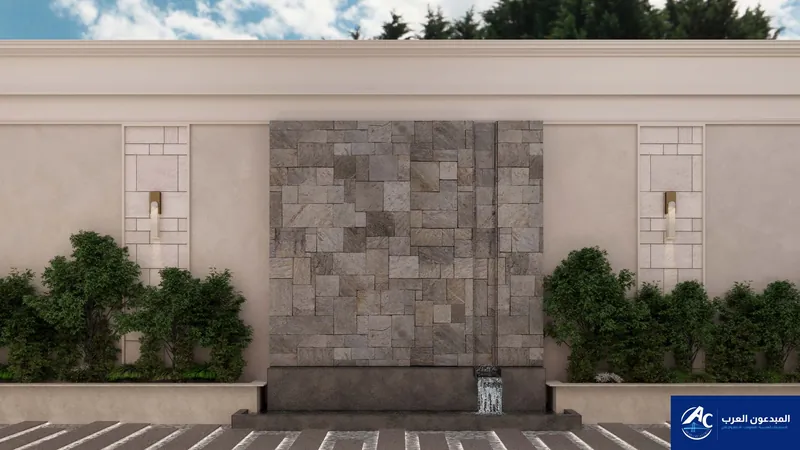 Stone-clad wall with a water cascade and planters on both sides